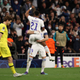 Rodrygo and Benzema celebrate a game-tying goal.
